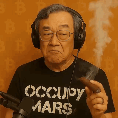 Man Wearing Headphones and Occupy Mars Shirt Smoking Cigar
