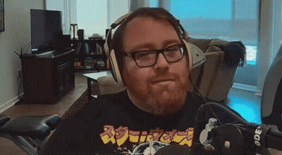 Man Wearing Headphones And Ode Shirt GIF