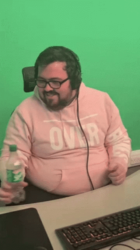 Man Wearing Headphones And Pink Sweatshirt GIF