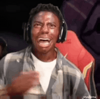 Man Wearing Headphones And Plaid Shirt GIF