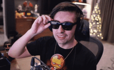 Man Wearing Headphones And Sunglasses In Iron Man Shirt GIF