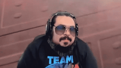 Man Wearing Headphones And Sunglasses With Team Shirt GIF