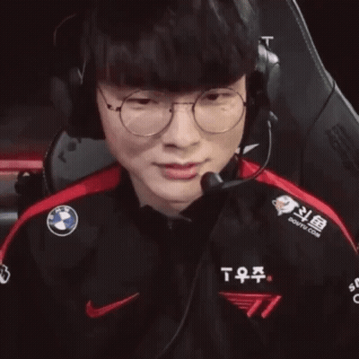 Man Wearing Headphones And T11 Shirt GIF