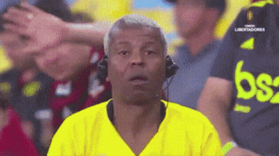 Man Wearing Headphones And Yellow Shirt With Letter B GIF