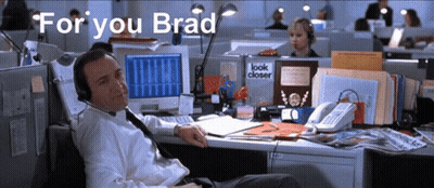 Man Wearing Headphones At Desk GIF