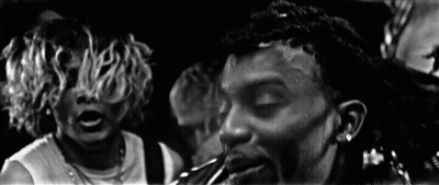 Man Wearing Headphones At Microphone GIF