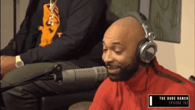 Man Wearing Headphones At Microphone GIF