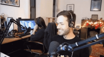 Man Wearing Headphones At Rode Microphone GIF