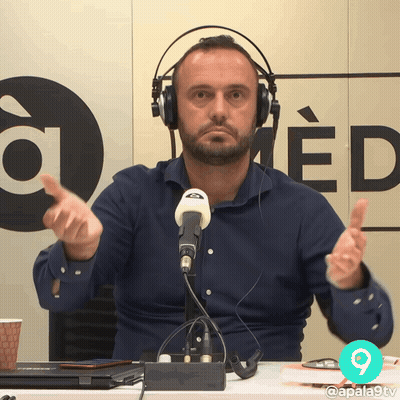 Man Wearing Headphones Giving Thumbs Up GIF