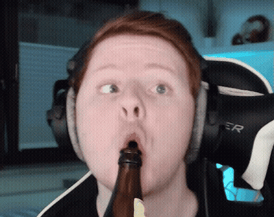 Man Wearing Headphones Holding Bottle GIF