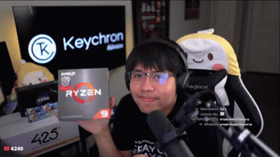 Man Wearing Headphones Holding Ryzen 9 Box GIF