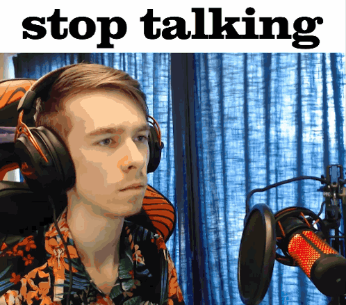 Man Wearing Headphones In Front Of Microphone GIF