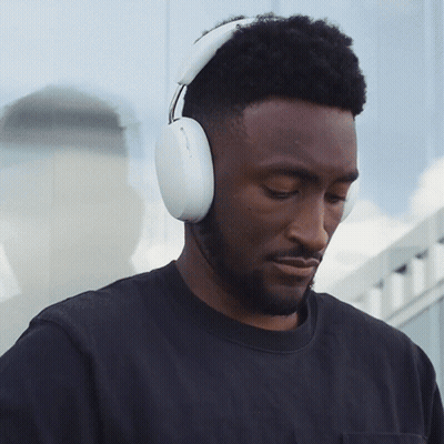 Man Wearing Headphones Looking Down GIF