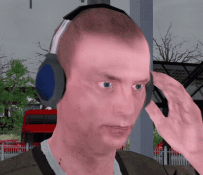Man Wearing Headphones Looking Into Distance GIF