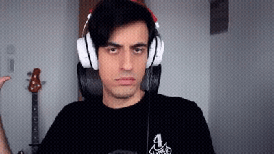 Man Wearing Headphones Making Funny Face GIF