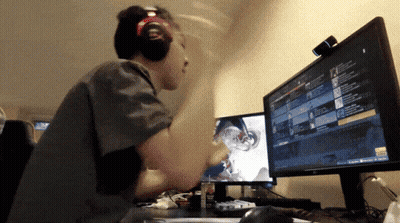 Man Wearing Headphones Playing Game On Computer GIF