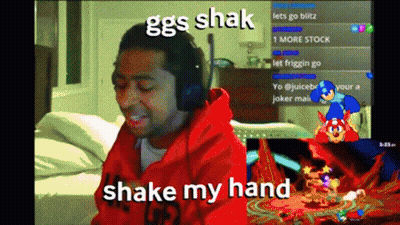 Man Wearing Headphones Playing Video Game Says Shake My Hand GIF