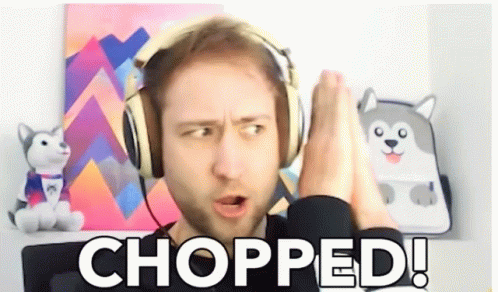 Man Wearing Headphones Says Chopped In Front Of Stuffed Husky GIF