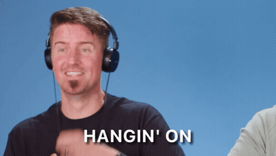 Man Wearing Headphones Says Hangin On GIF