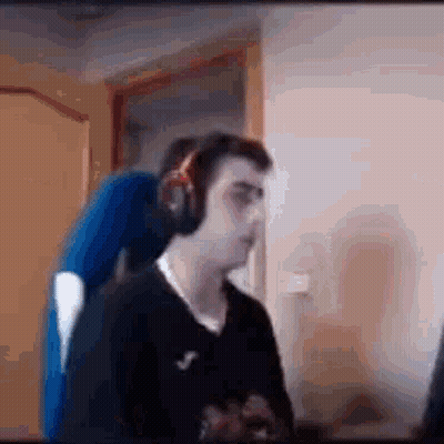Man Wearing Headphones Sitting At Computer GIF
