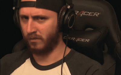 Man Wearing Headphones Sitting In Gaming Chair GIF