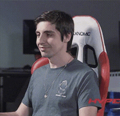 Man Wearing Headphones Sitting On Couch GIF