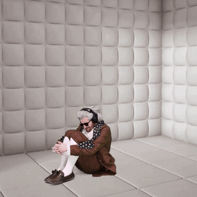 Man Wearing Headphones Sitting On Floor GIF