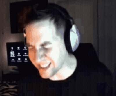 Man Wearing Headphones Smiling At Computer GIF