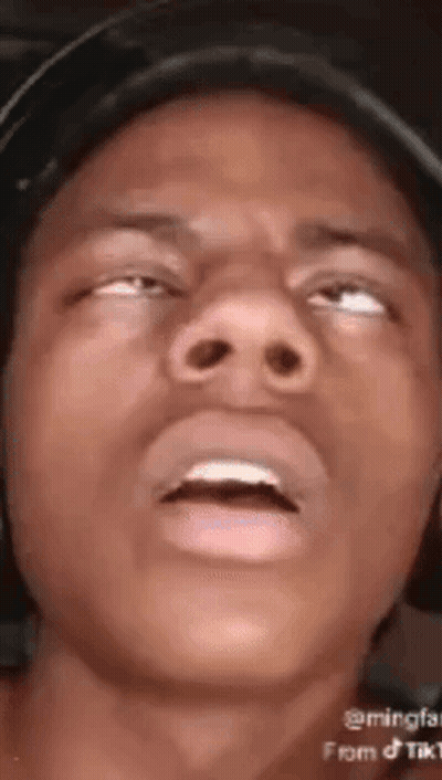 Man Wearing Headphones Smiling At Screen GIF