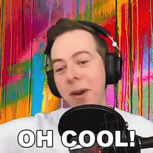 Man Wearing Headphones Standing In Front Of Microphone Saying Oh Cool GIF