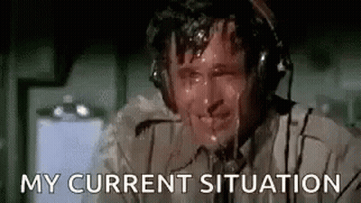 Man Wearing Headphones Sweating In Airplane GIF