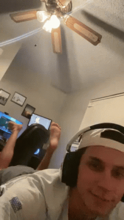 Man Wearing Headphones Taking Selfie GIF