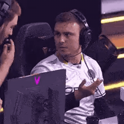 Man Wearing Headphones Talking To Another GIF