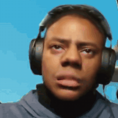 Man Wearing Headphones Tongue Out GIF