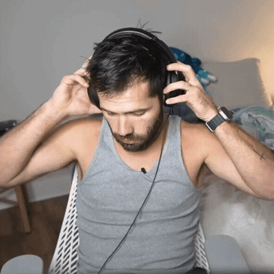Man Wearing Headphones With Arm Tattoo GIF