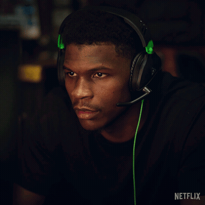 Man Wearing Headphones With Green Cord And Netflix Logo GIF