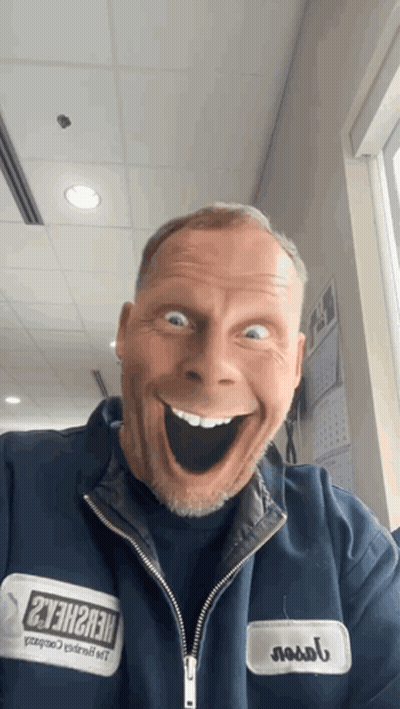 Man Wearing Hershey's Jacket GIF