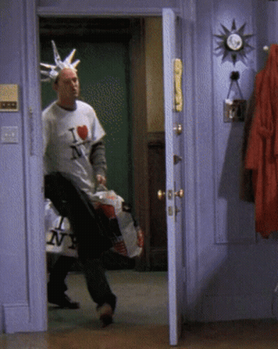 Man Wearing I Love NY Shirt In Doorway GIF