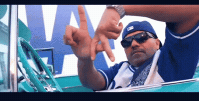 Man Wearing M Hat Giving Middle Finger GIF
