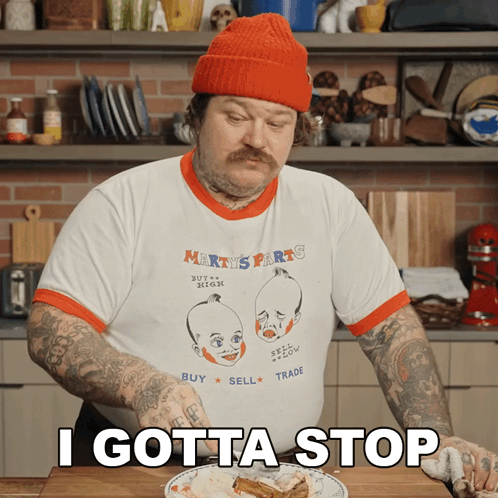 Man Wearing Marty's Parts Buy High Sell Low Trade Shirt GIF