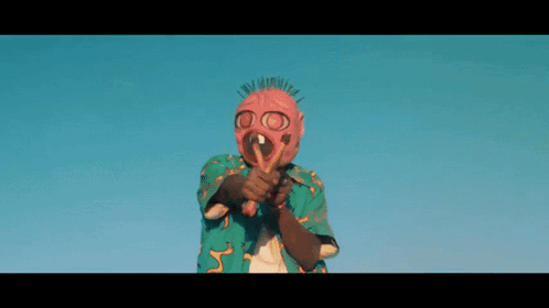 Man Wearing Mask And Glasses Holding Gun GIF