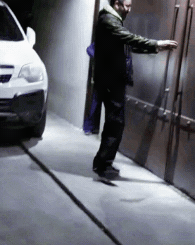 Man Wearing Mask Next To Car GIF