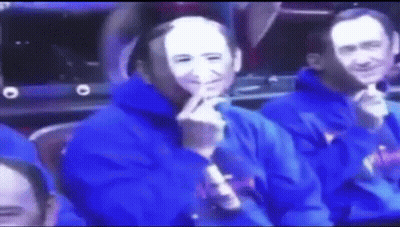 Man Wearing Mask Sitting In Stadium GIF