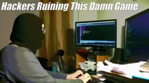 Man Wearing Mask Typing On Computer GIF