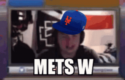 Man Wearing Mets Hat On Computer GIF