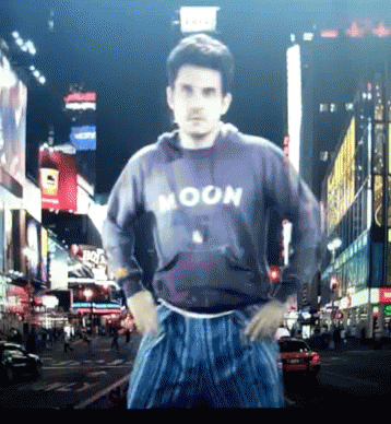 Man Wearing Moon Sweatshirt GIF
