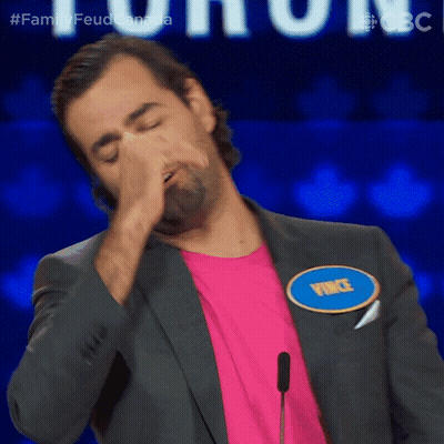 Man Wearing Name Tag That Says Price GIF