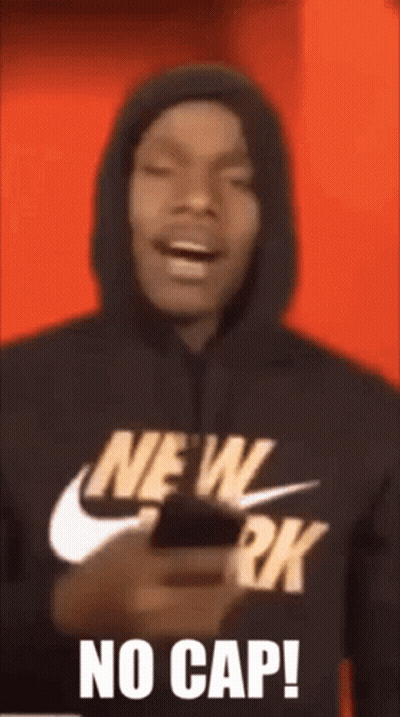 Man Wearing New York Hoodie Holding Phone GIF