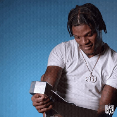 Man Wearing NFL Logo Necklace GIF