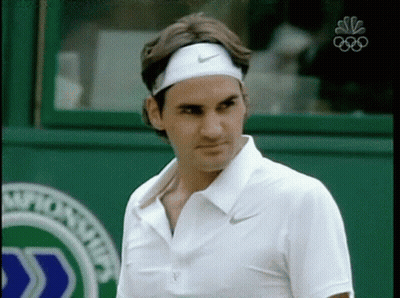 Man Wearing Nike Headband In Front Of NBC Sign GIF